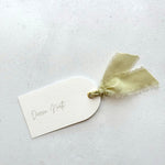 handmade arched personalised wedding place name card in sage green