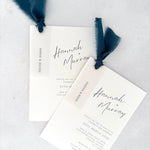 Navy silk ribbon Hannah handmade wedding invite with printed guest names on vellum tags