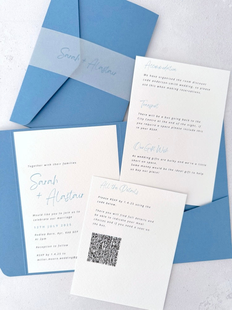 Dusky blue Sarah pocketfold wedding invite with 2 insert cards for menu and guest details, and QR code with vellum bellyband