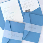 Sarah Pocketfold wedding invites with personalised vellum belly bands in duky cornflower blue