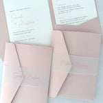 Sarah Pocketfold wedding invites with personalised vellum belly bands in rose pink