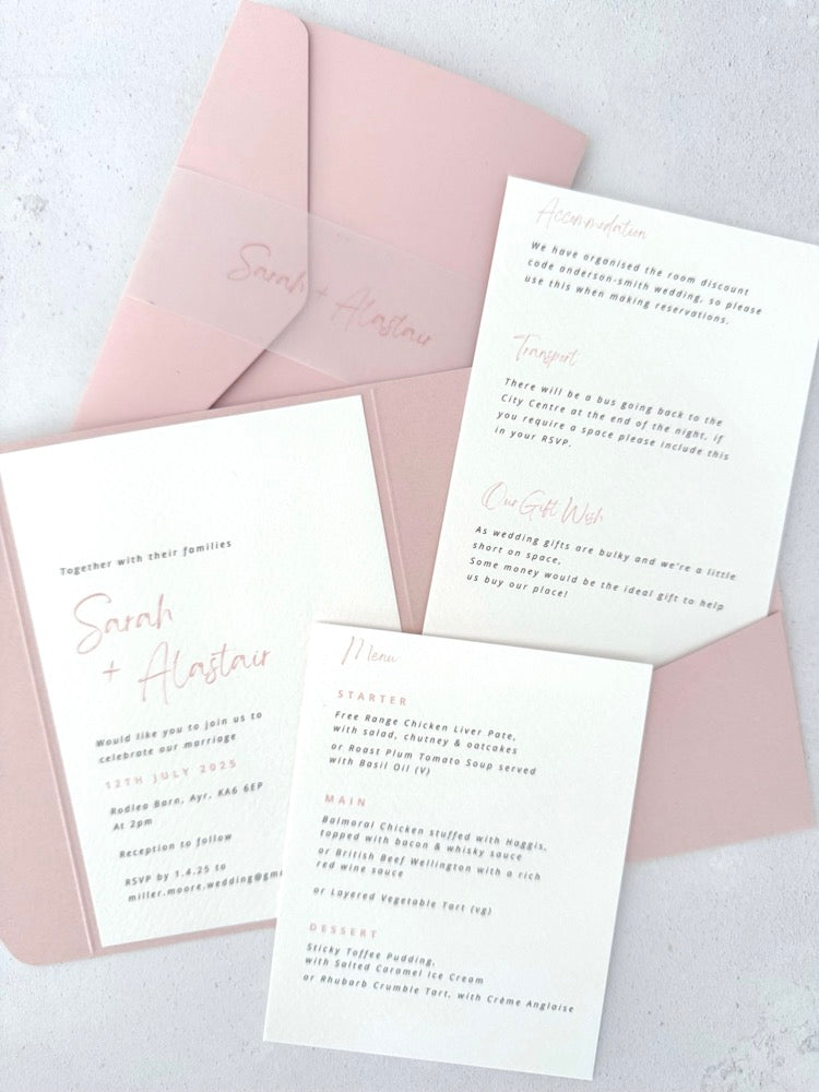 Sarah pocketfold wedding invite with 2 insert cards for menu and guest details, in blush pink, with vellum bellyband