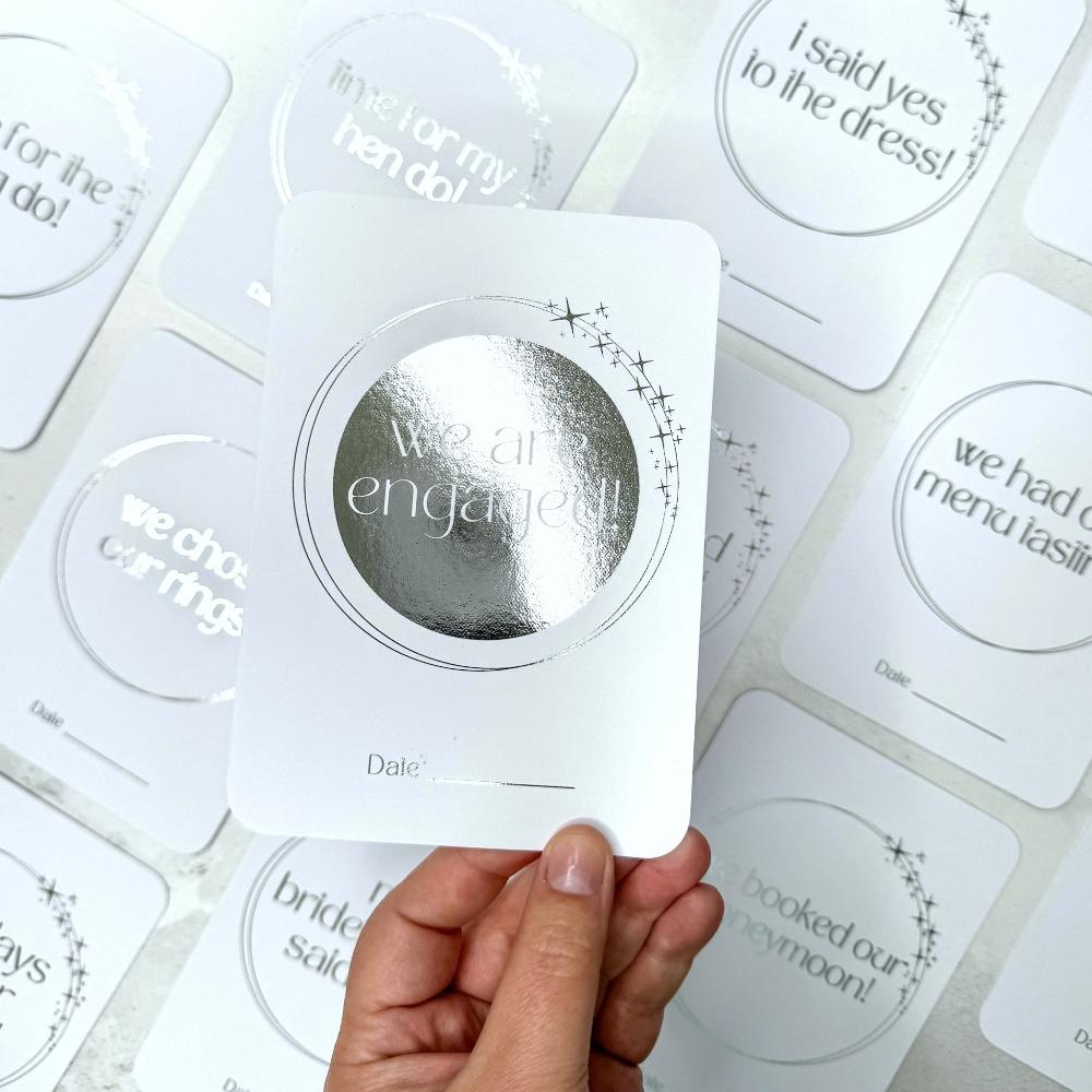 we are engaged shiny silver foil stars engagement milestone cards