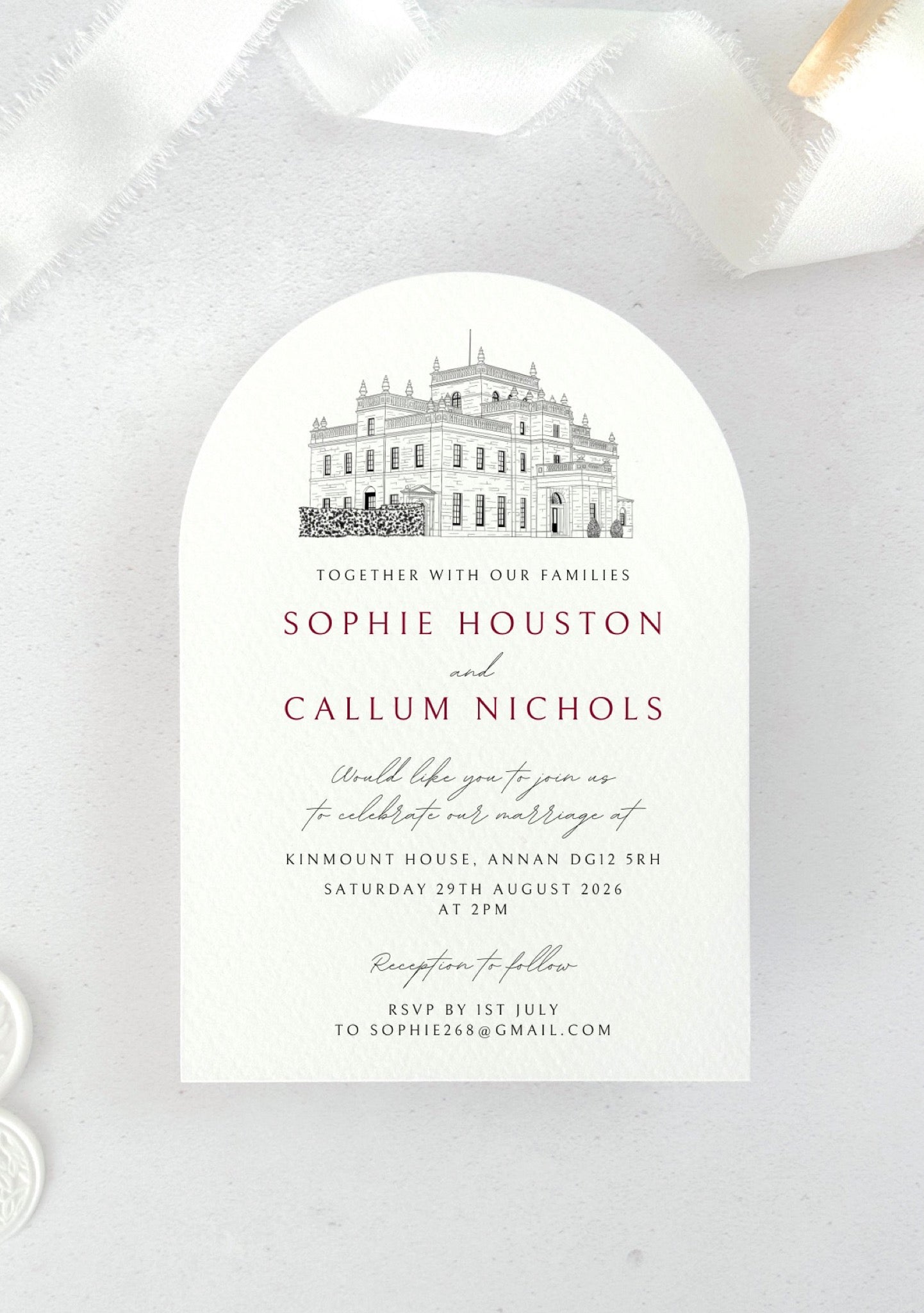 Arch shaped wedding invite with venue illustration of Kinmount House, Annan, Dumfries & Galloway, in burgundy
