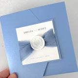 Dusky Blue pocket wedding invite with silk ribbon and handmade wax seal
