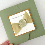 Handmade sage green ailsa wedding invite with silk ribbon and wax seal