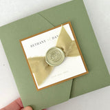 Handmade sage green ailsa wedding invite with silk ribbon and wax seal
