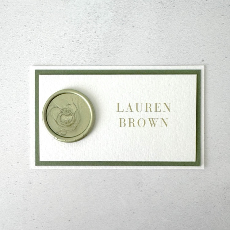 Sage green handmade wax seal personalised printed place card on the day wedding stationery