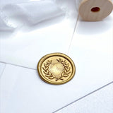 bright gold olive wreath wax seal for wedding invites