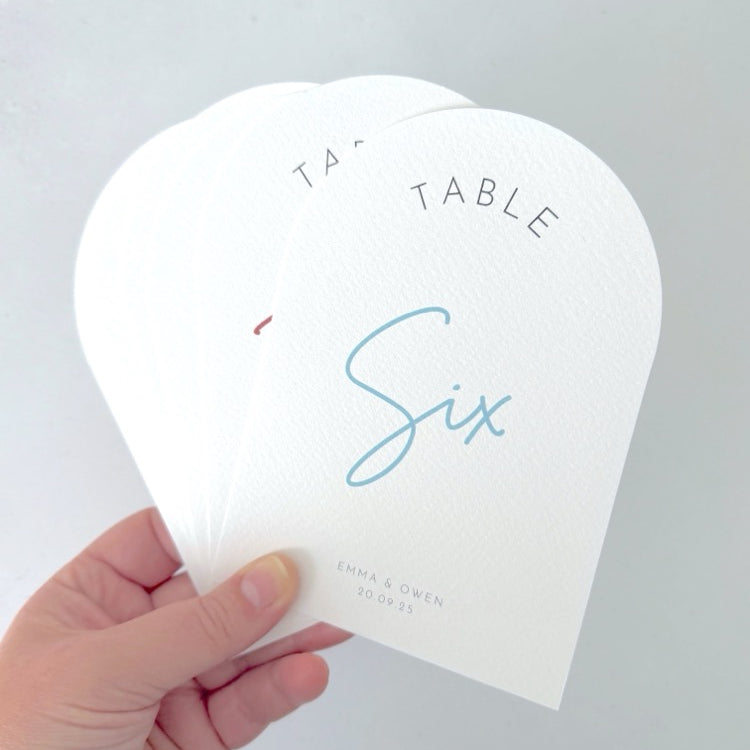 On the day wedding stationery Emma arched shaped table number cards