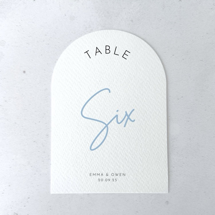 Dusty powder blue arched table number card. Table six