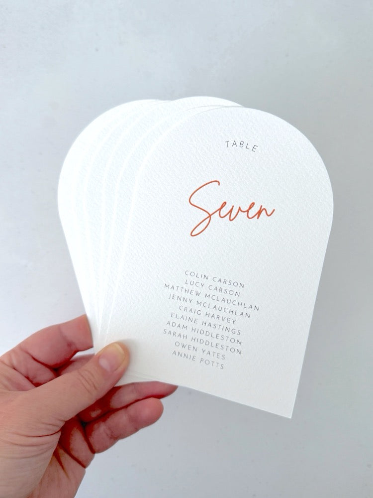 Emma arch shaped table plan cards for seating chart available in 6 colours on white textured card.