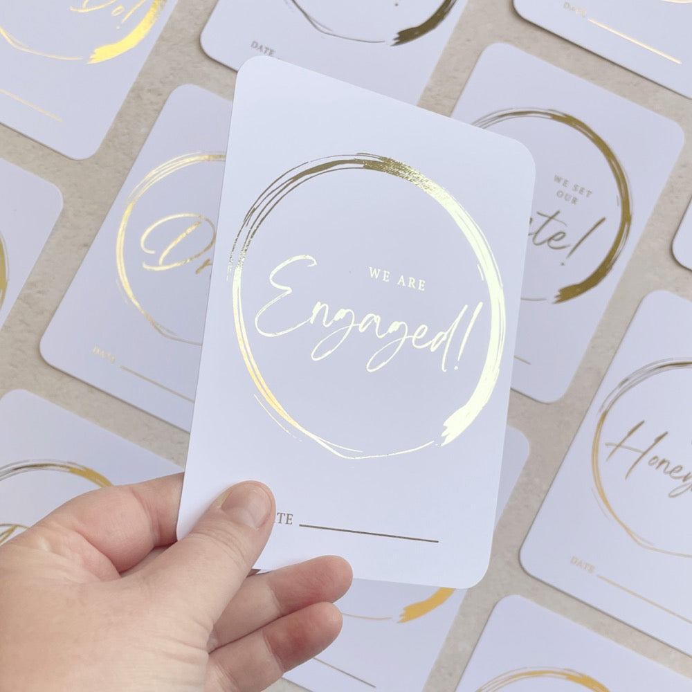 minimalist brush gold circle milestone cards for wedding planning gift