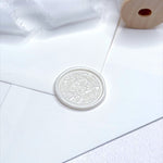 pearl ivory wax seal with leaf pattern