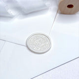 pearl ivory wax seal with leaf pattern