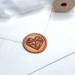 geometric heart wax seal in rose gold for wedding invites and envelopes