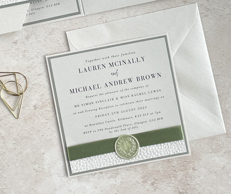 sage green evening wedding invite with ribbon and wax seal
