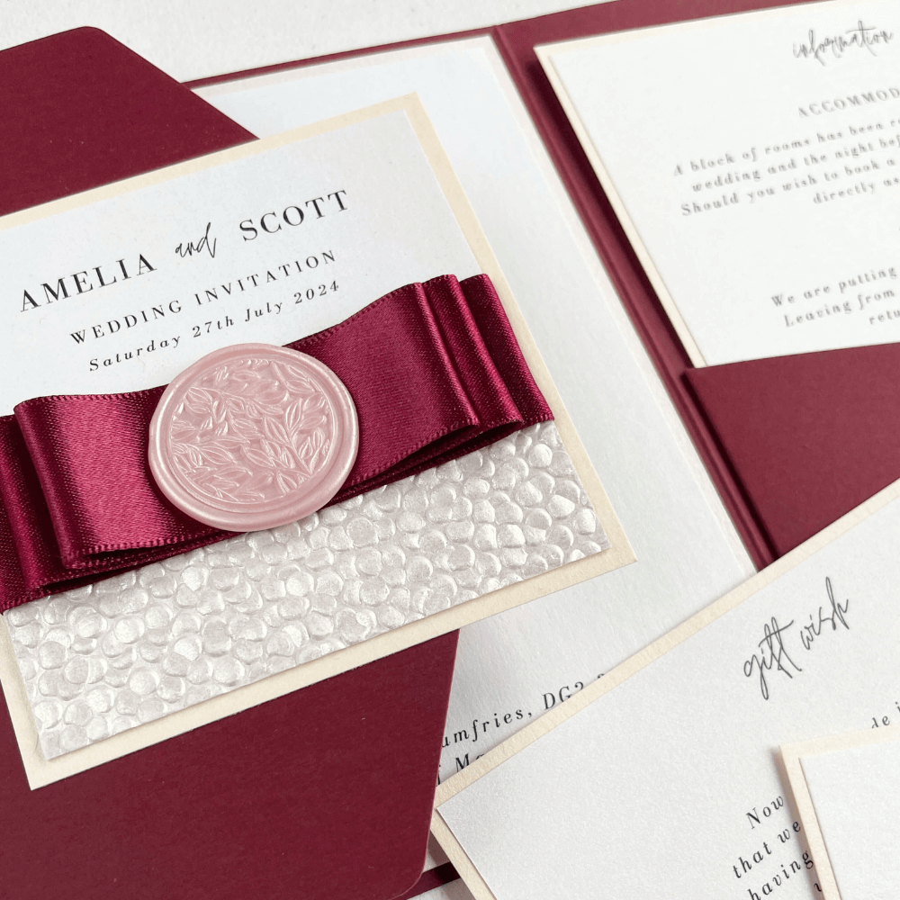 burgundy and pink handmade foliage wax seal pocket fold wedding invite