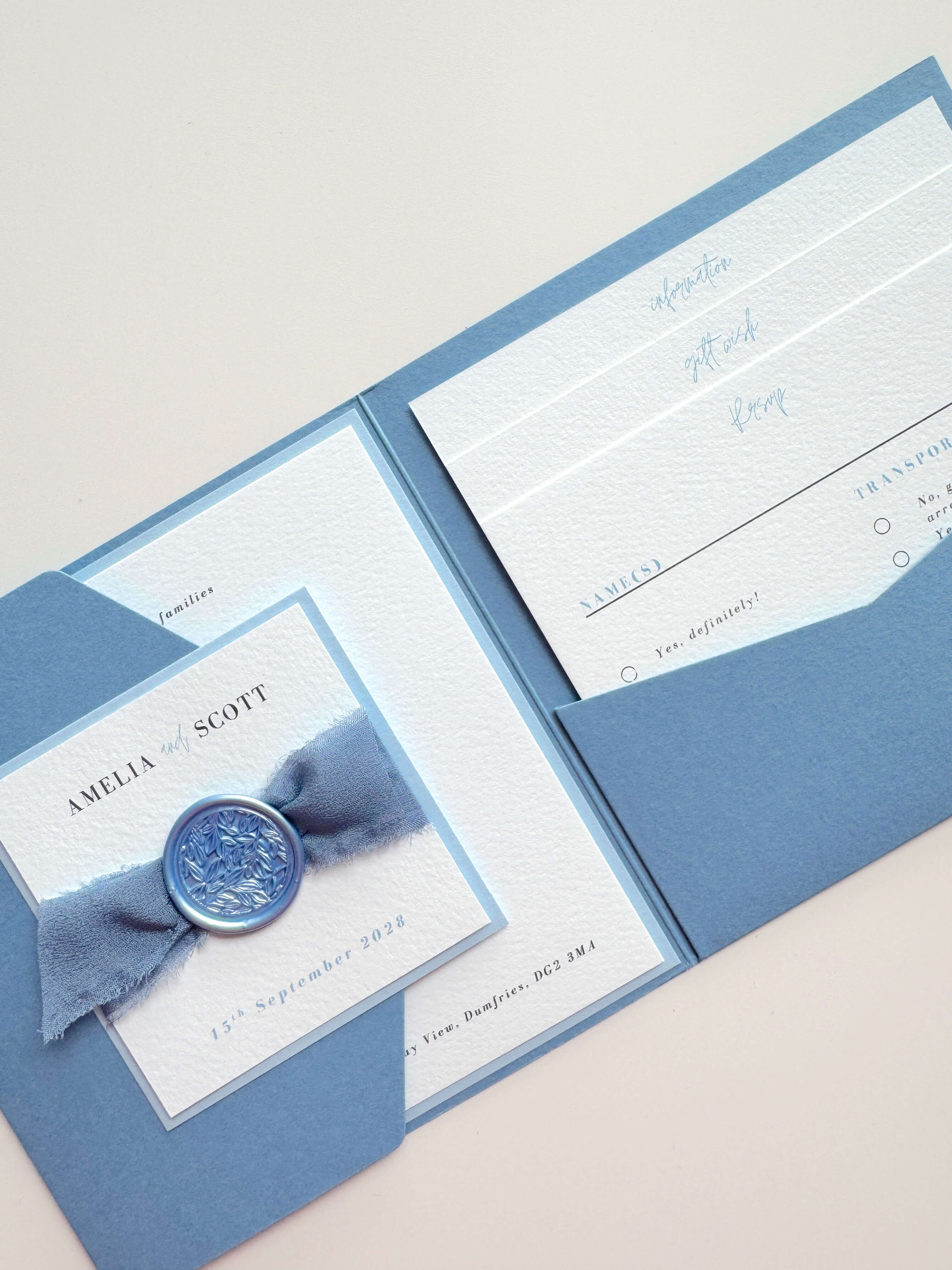 Dusty cornflower blue pocket wedding invite with info and gift wish cards