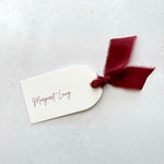 Emma arch place card with burgundy silk ribbon and metal eyelet and personalised guest name, Handmade by Zara Dumfries