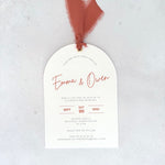 Emma arch wedding invite with rust orange silk ribbon and metal eyelet