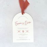 Emma arch wedding invite with rust orange silk ribbon and metal eyelet