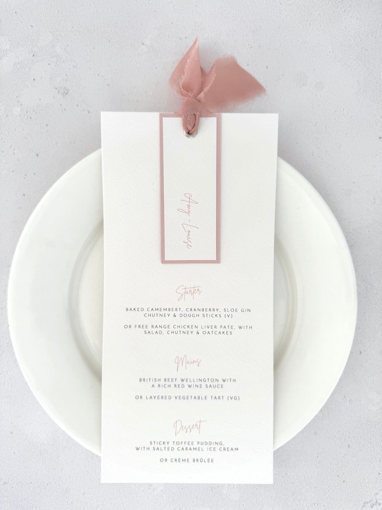 Blush pink Emma wedding menu with silk ribbon and personalised name tag, Handmade by Zara