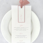 Blush pink Emma wedding menu with silk ribbon and personalised name tag, Handmade by Zara