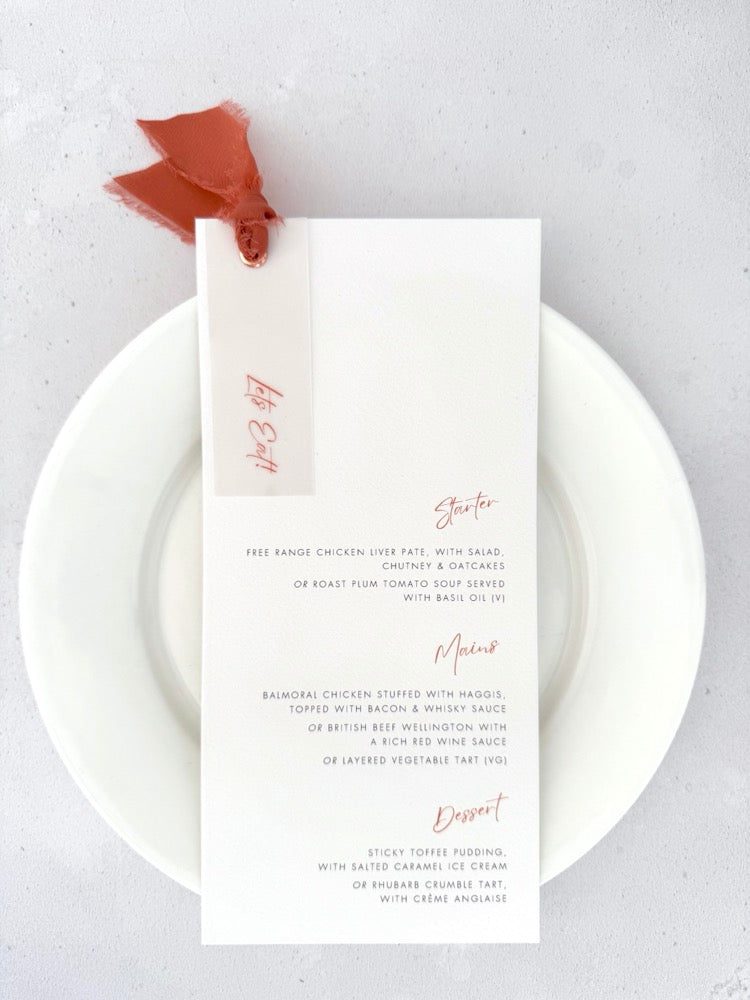 rust orange silk ribbon and eyelet vellum tag wedding menu handmade by zara