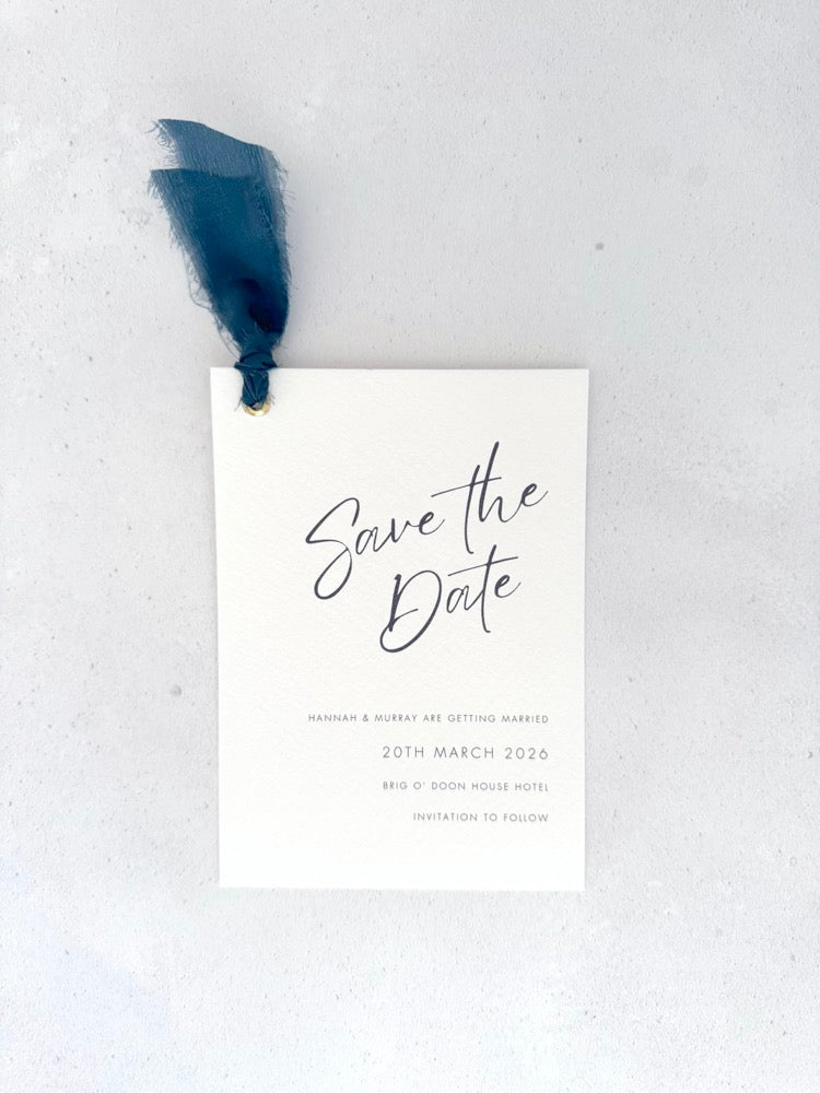 Navy tied silk ribbon save the date card