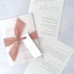 Pink Hannah vellum wrap wedding invite with tied silk ribbon and guest name tag. Insert card for wedding info and menu options. Handmade by Zara 