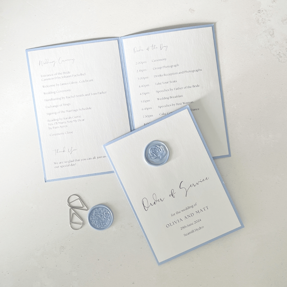 Wax seal  order of service on the dat wedding stationery