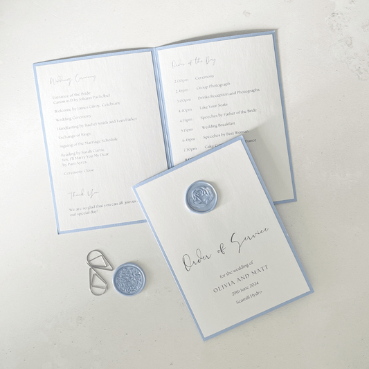 Wax seal  order of service on the dat wedding stationery