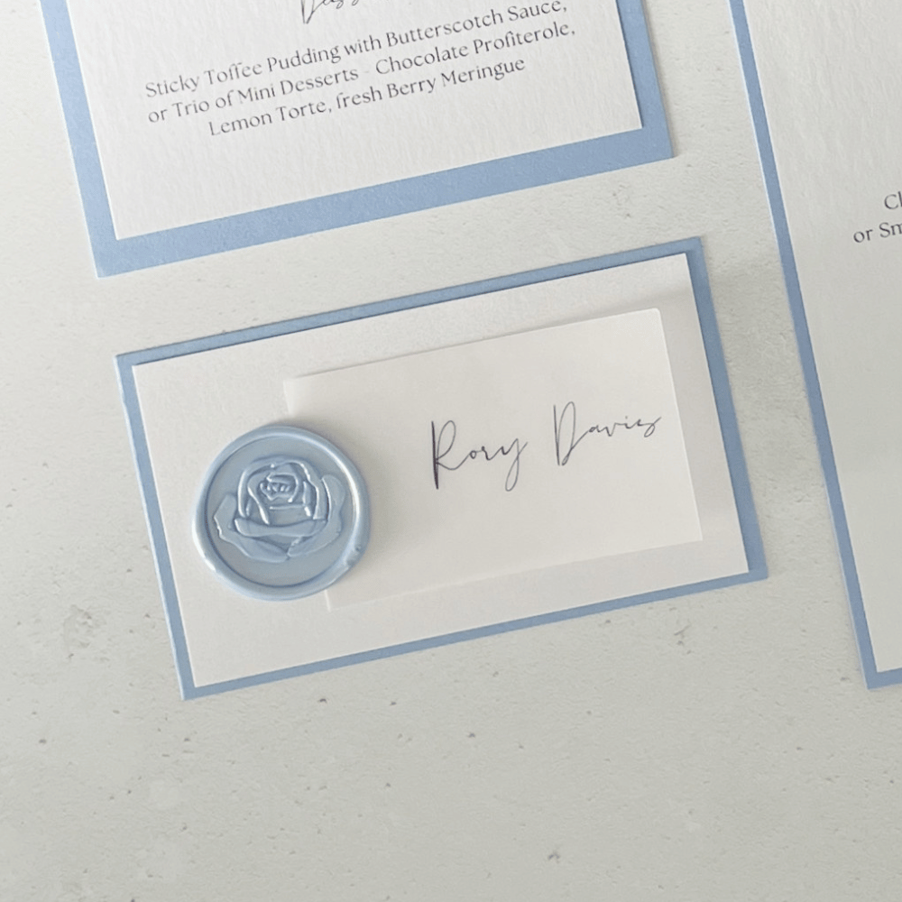 Vellum and wax seal place card dusty blue