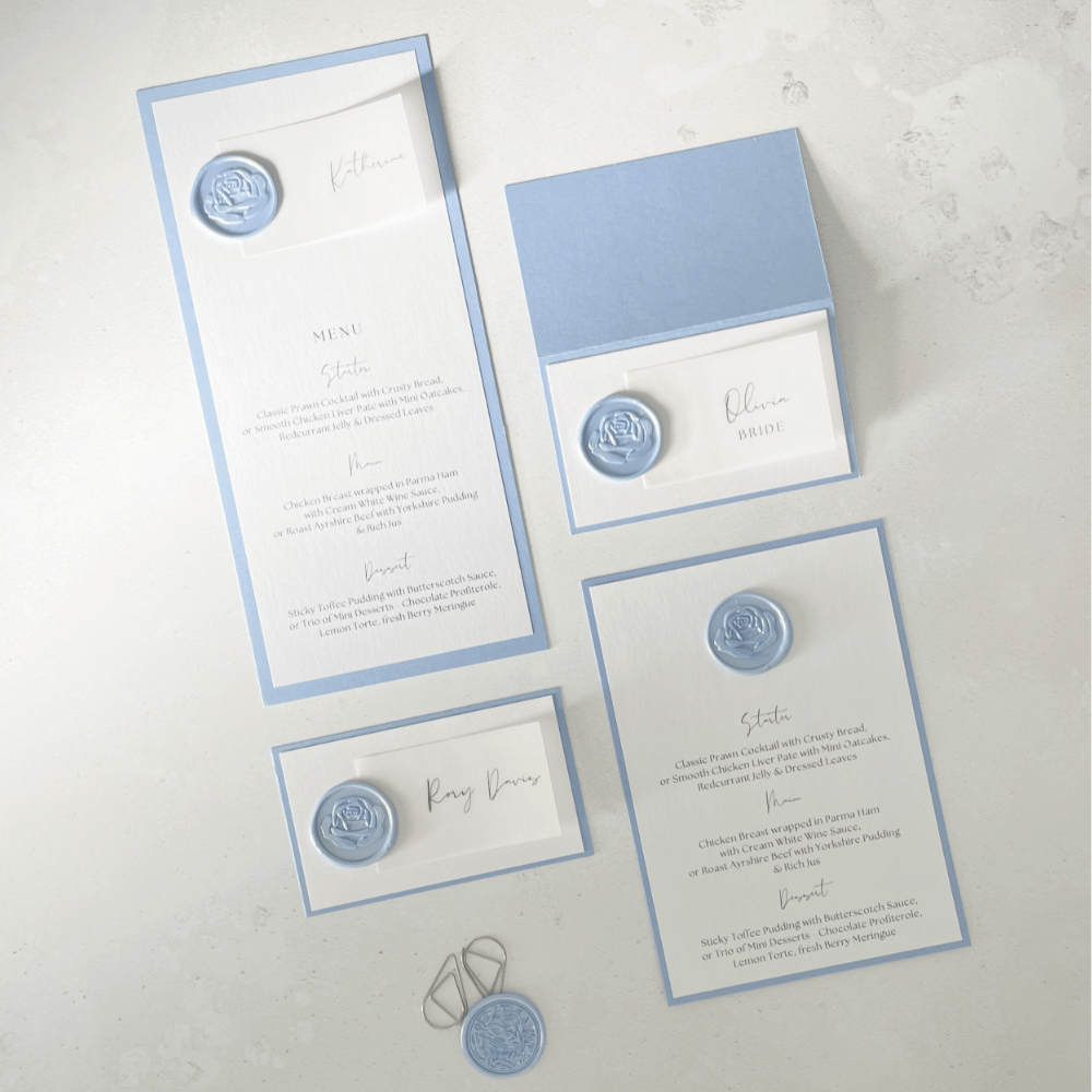 Vellum and handmade wax seals place cards and menu
