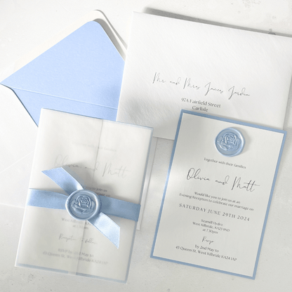 vellum wrap handmade dusty blue wax seal day and evening wedding invite