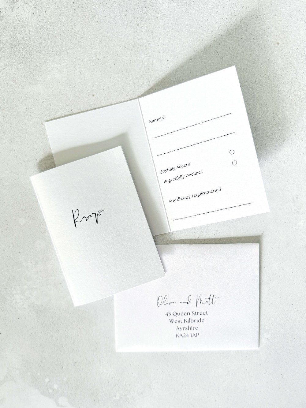 Mini folded rsvp card and addressed envelopes