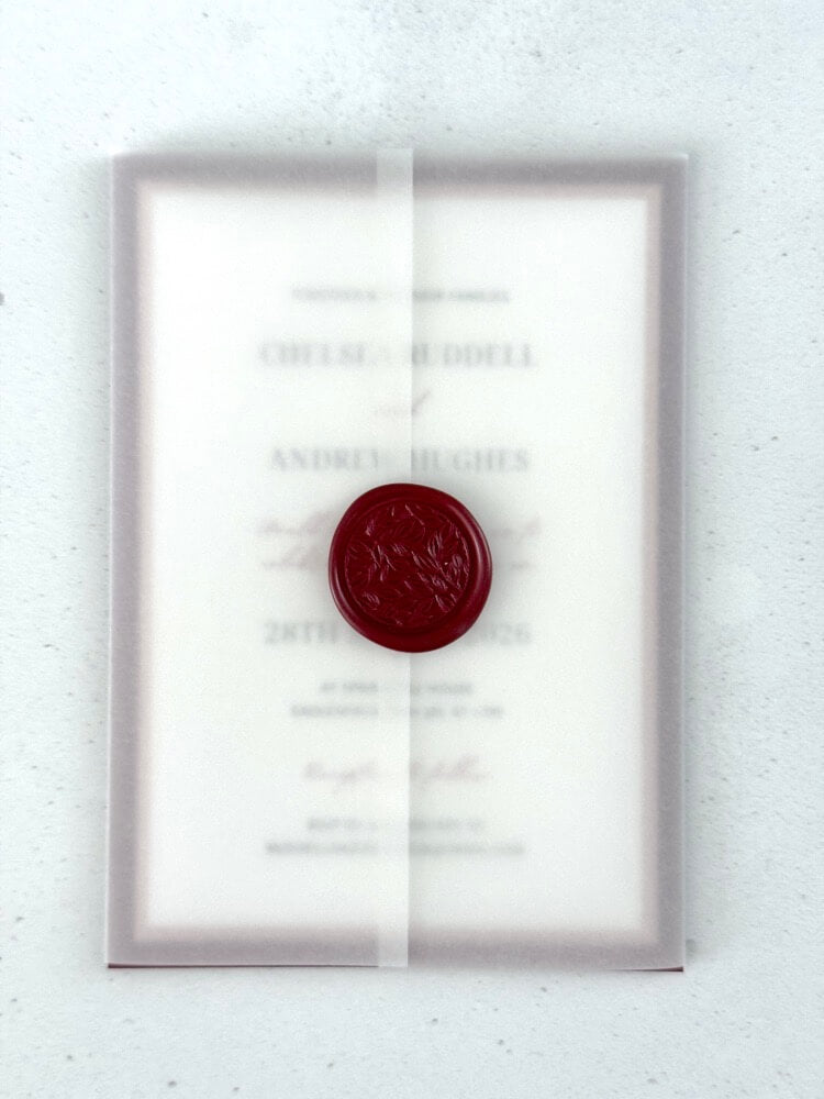See through vellum paper wedding invite with burgundy wax seal