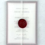See through vellum paper wedding invite with burgundy wax seal