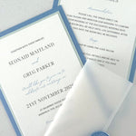 Jeni invite in dusky blue with info card and transparent vellum wrap handmade by zara dumfries