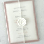Transparent paper jacket wedding invite with wax seal