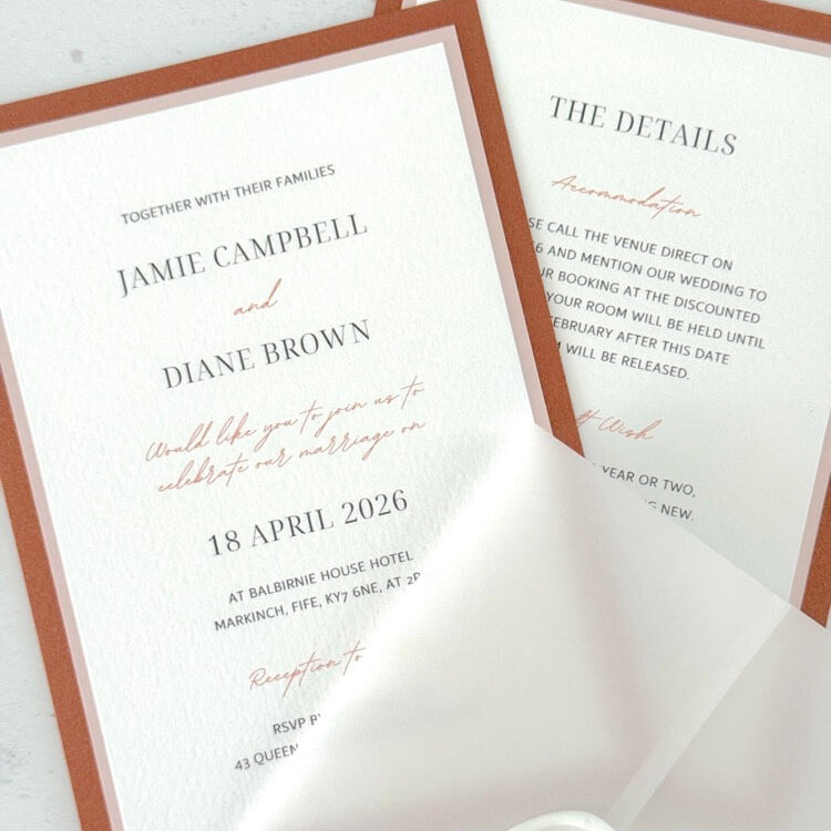 terracotta orange wax seal vellum wrapped wedding invite
