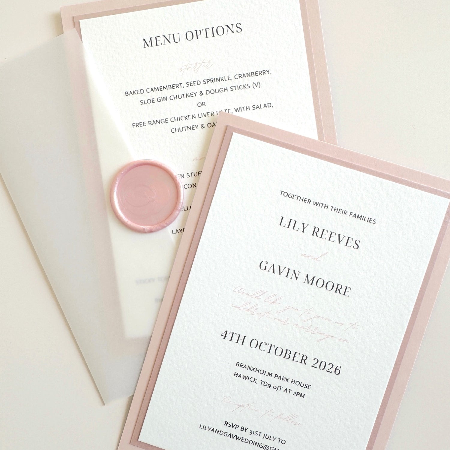 Transparent paper jacket wedding invite with wax seal in blush pink