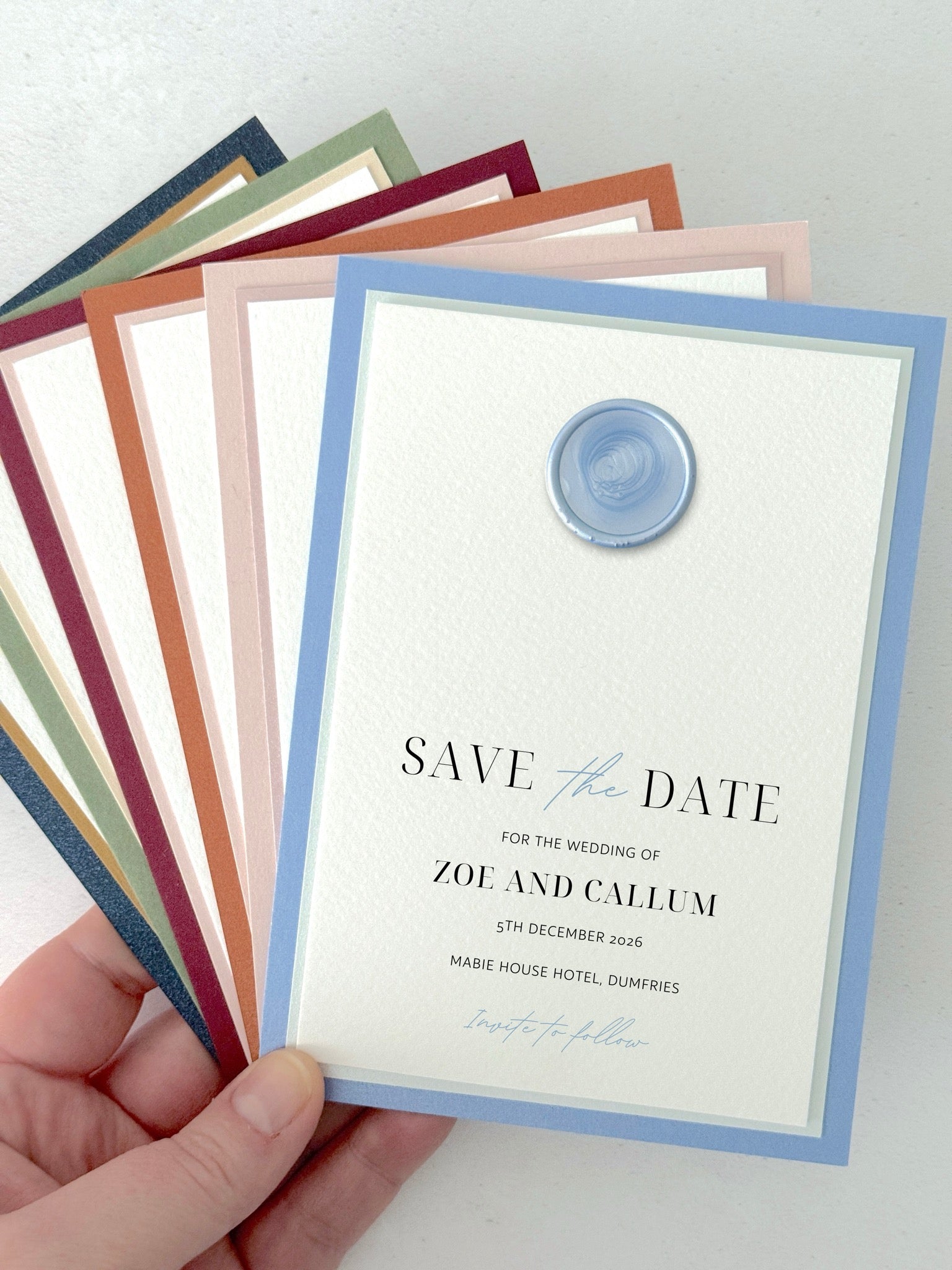 minimalist Jeni save the date card, dusky blue wax seal