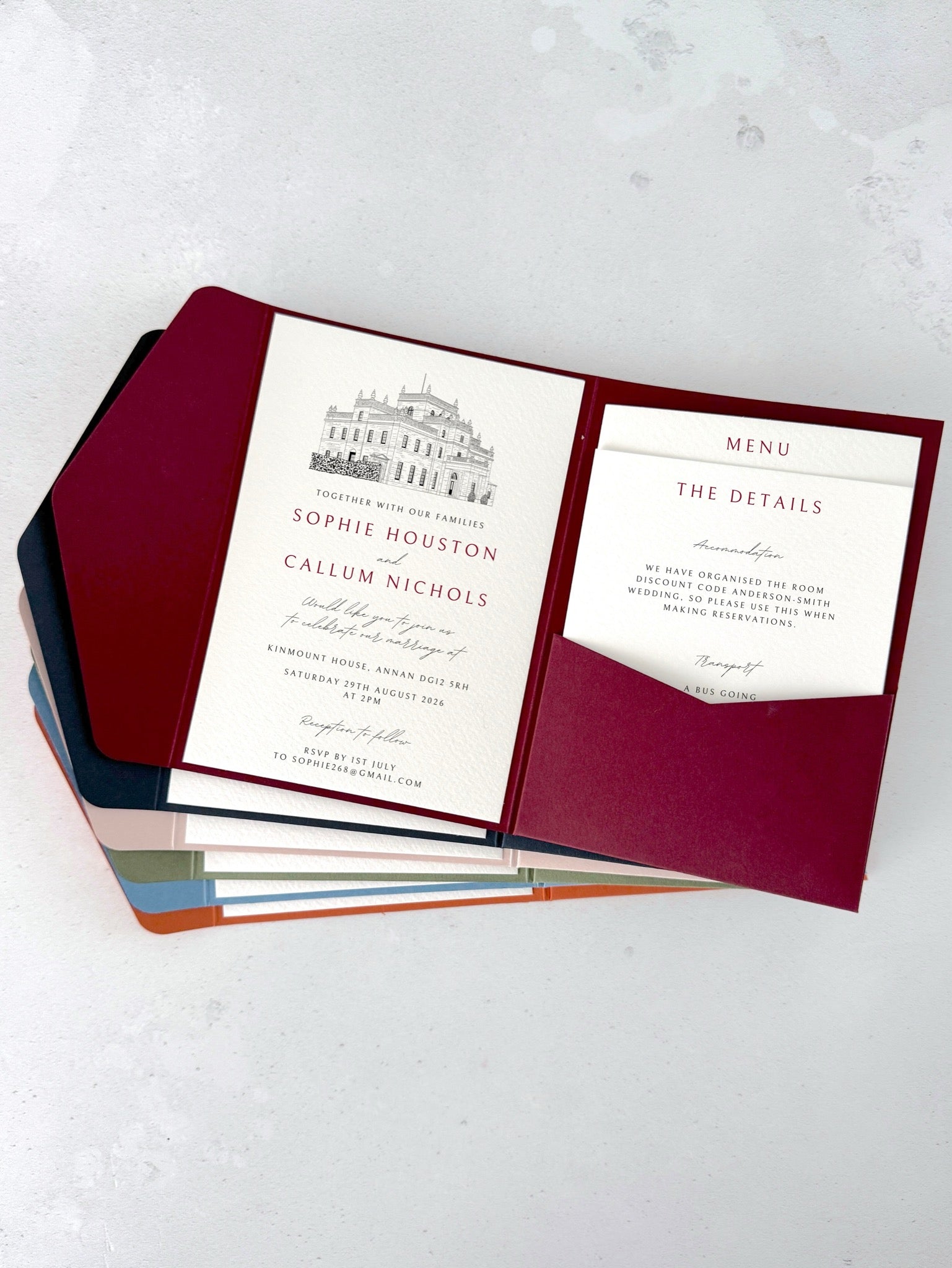 Burgundy pocketfold wedding invitation with venue illustration or Kinmount House, Annan, D&G