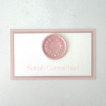 dusty pink wax seal printed place card on the day wedding stationery