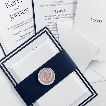 Navy and pink geometric heart wax seal belly band invite