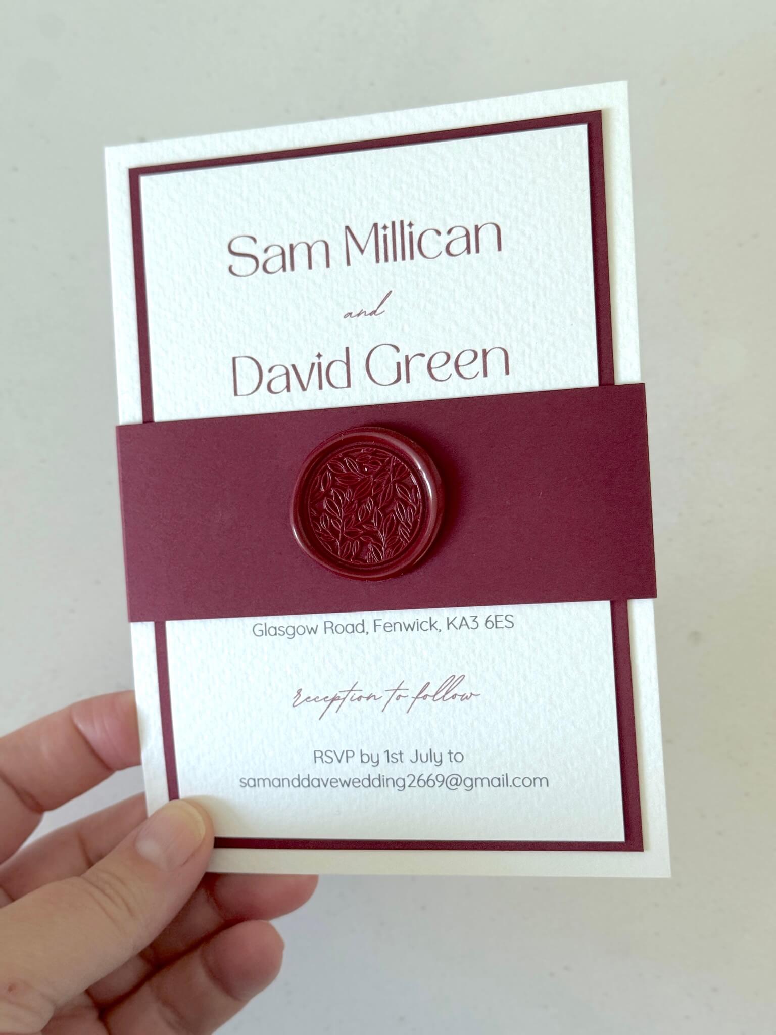Lyn burgundy red and white wedding invite with belly band and wax seal
