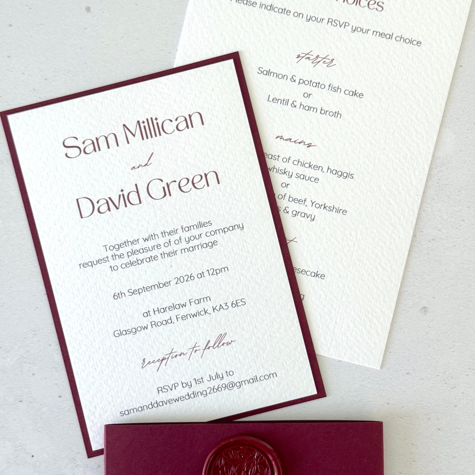 Red and white wedding invite with details postcard with burgundy belly band and handmade wax seal