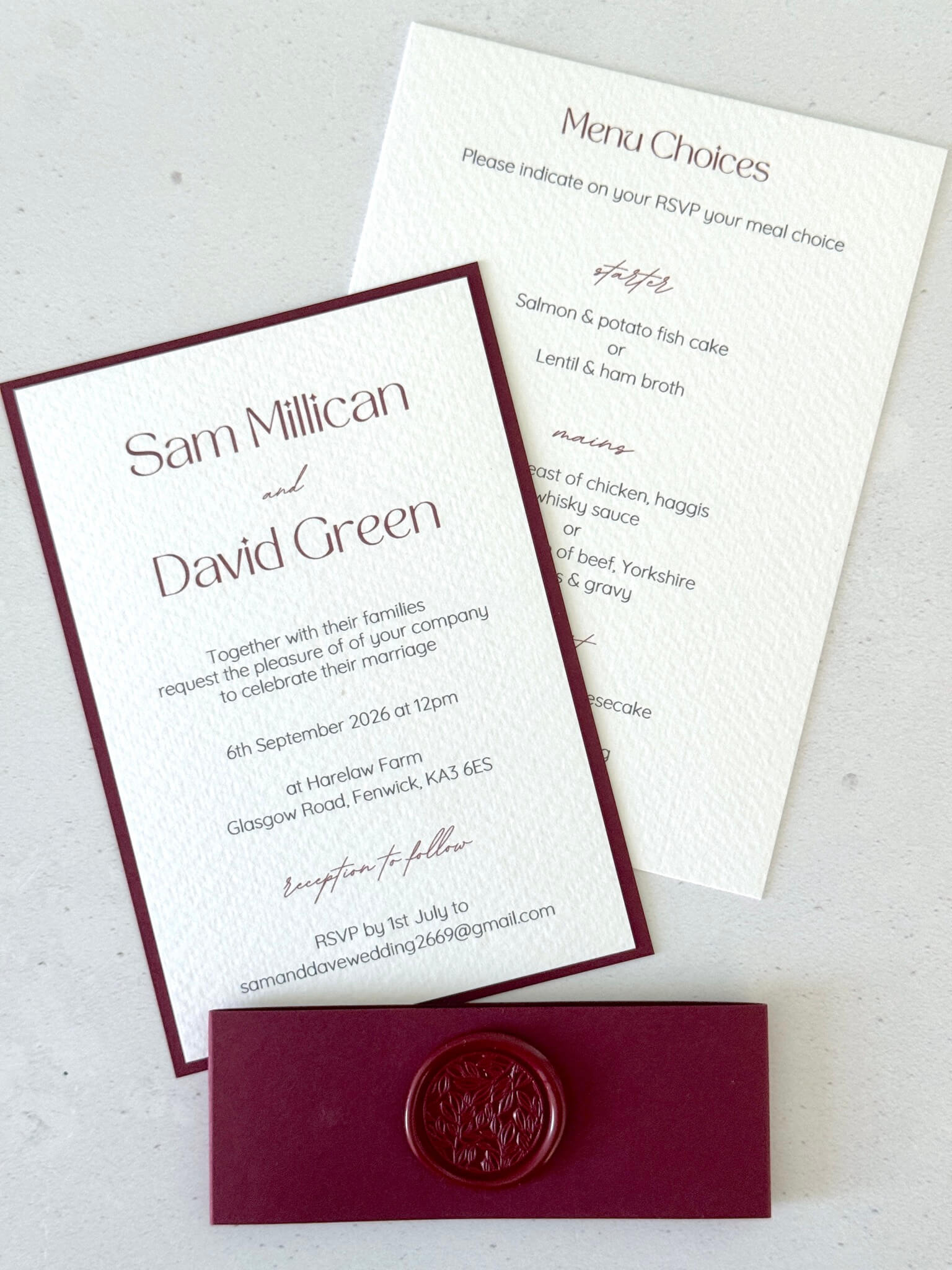Red and white wedding invite with details postcard with burgundy belly band and handmade wax seal